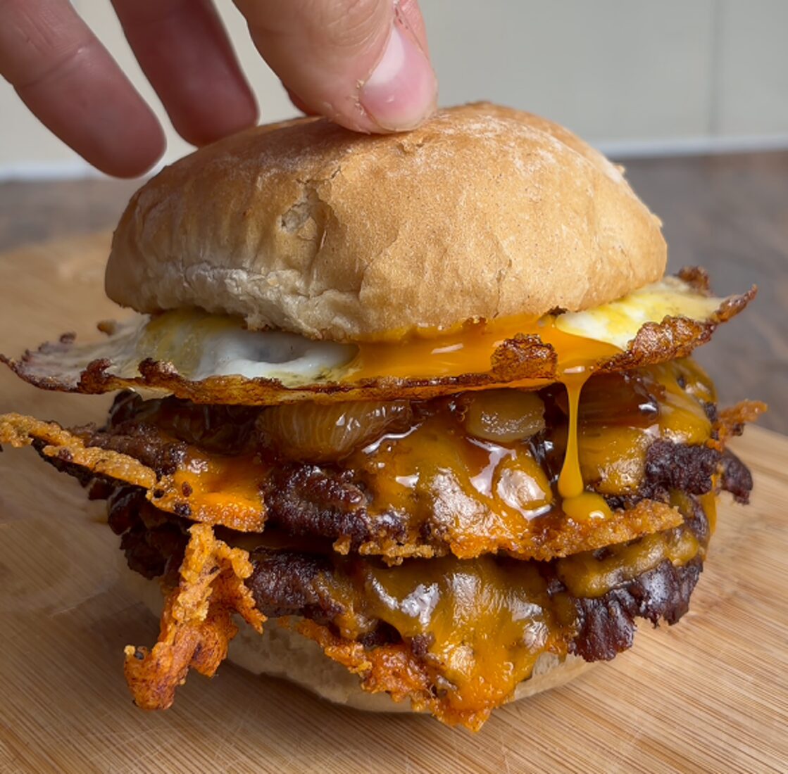 The High Test smashed beef burger with fried egg, melted cheese and crispy sweet potato hash